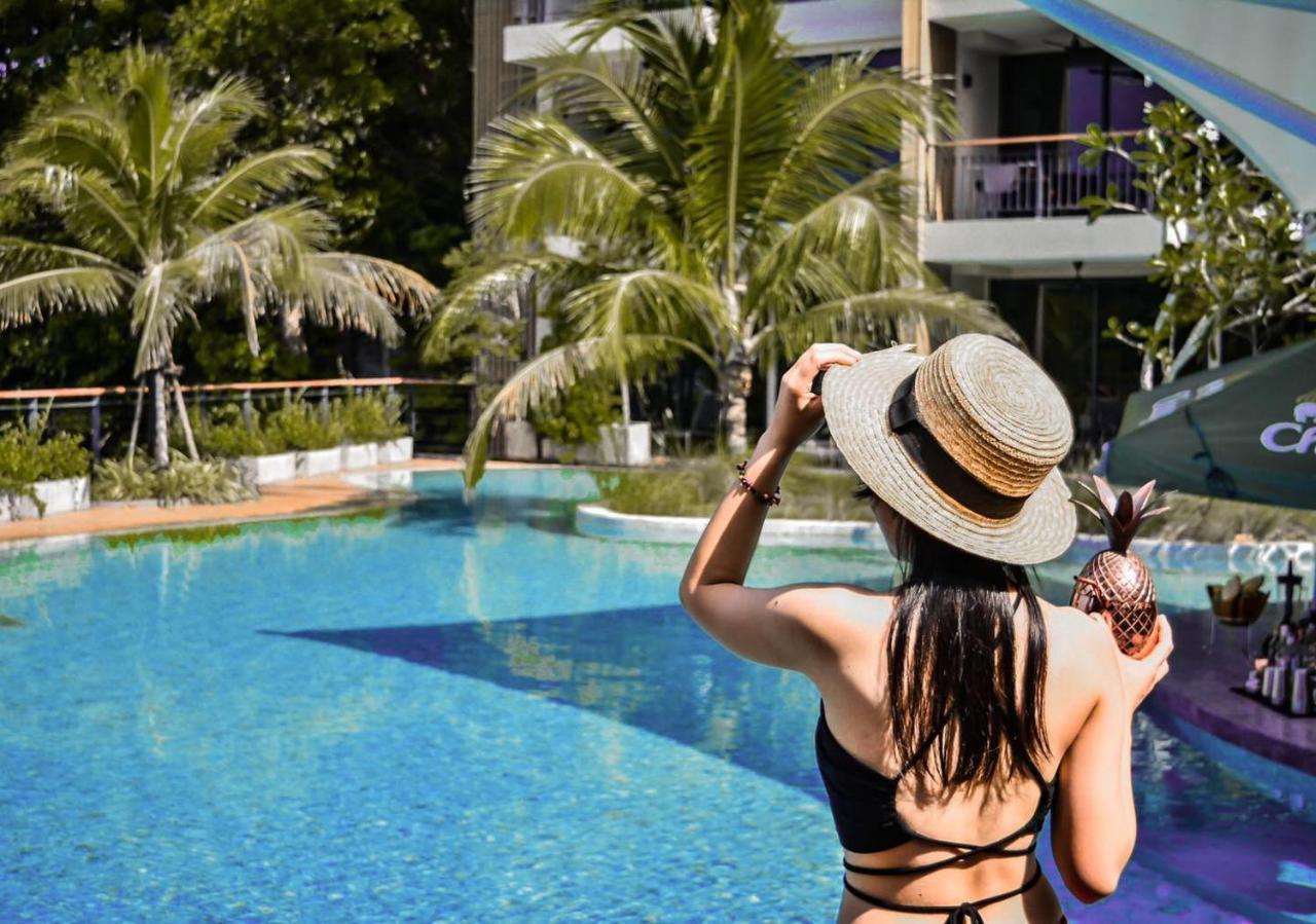 Skyview Resort Phuket Patong Beach Екстериор снимка A woman at a pool