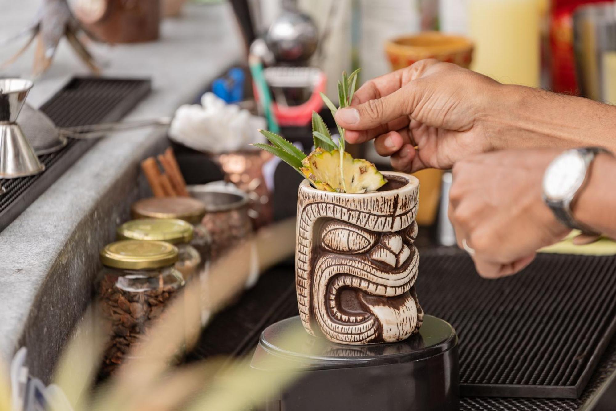 Skyview Resort Phuket Patong Beach Екстериор снимка A tiki drink being garnished
